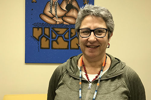 Brenda Dubois, Grandmother at the University of Regina, emphasized that it's important for women from diverse backgrounds to gather together to find common ground on International Women's Day. Photo by Janelle Blakley. 